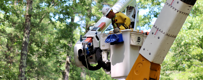 Eversource lineworker in a bucket truck