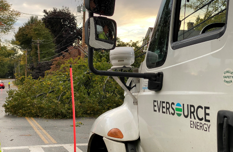 Eversource truck parked at the scene of a downed tree