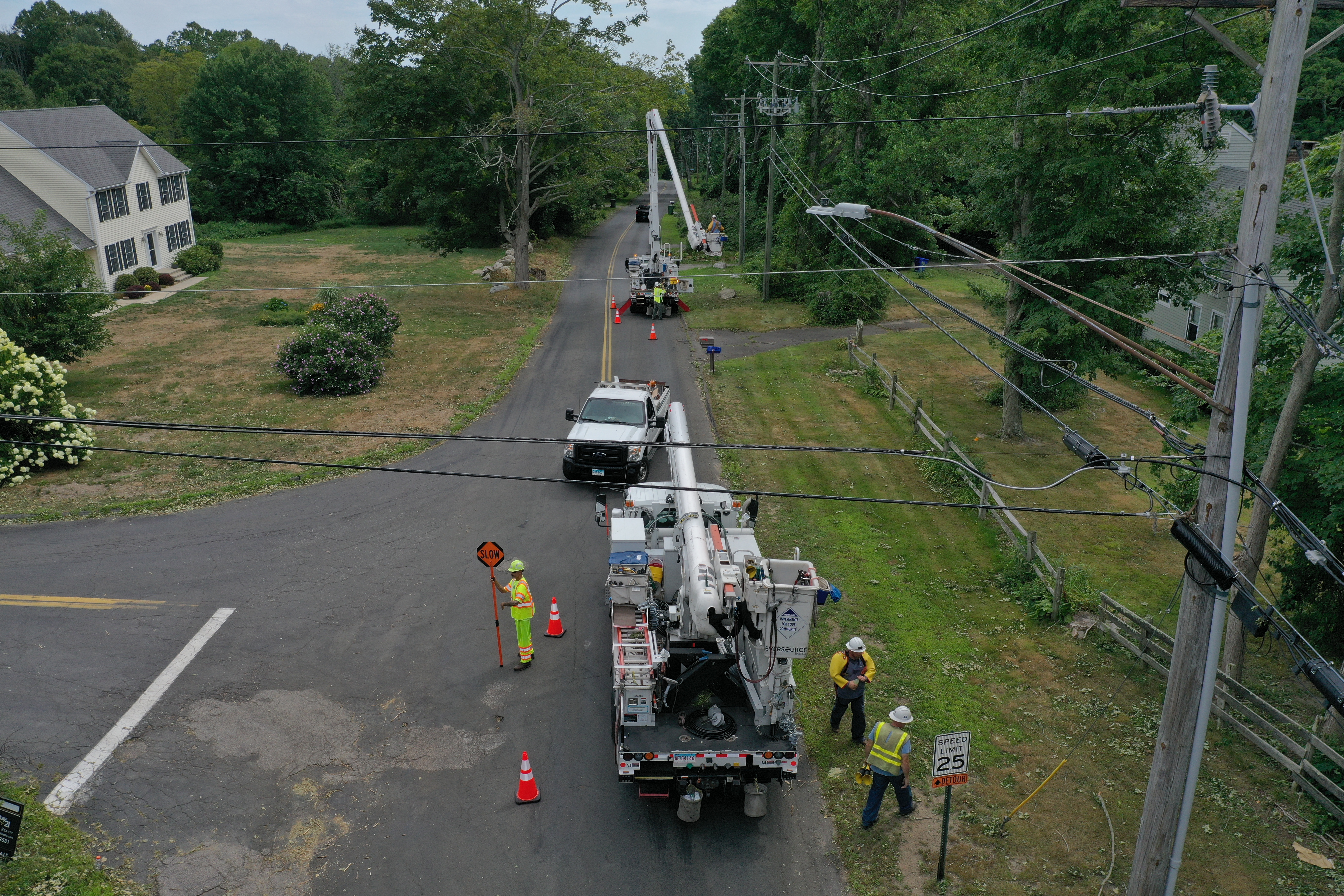 Drone photo of a line crew restoring power in Connecticut