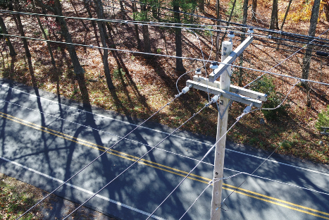 Aerial photo of an electric distribution line along a roadway