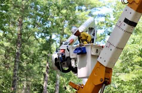 Eversource line worker in a bucket truck