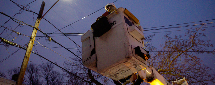 Eversource line person in bucket truck