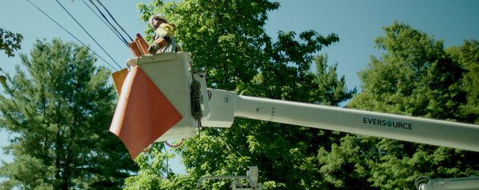 Worker in bucket truck