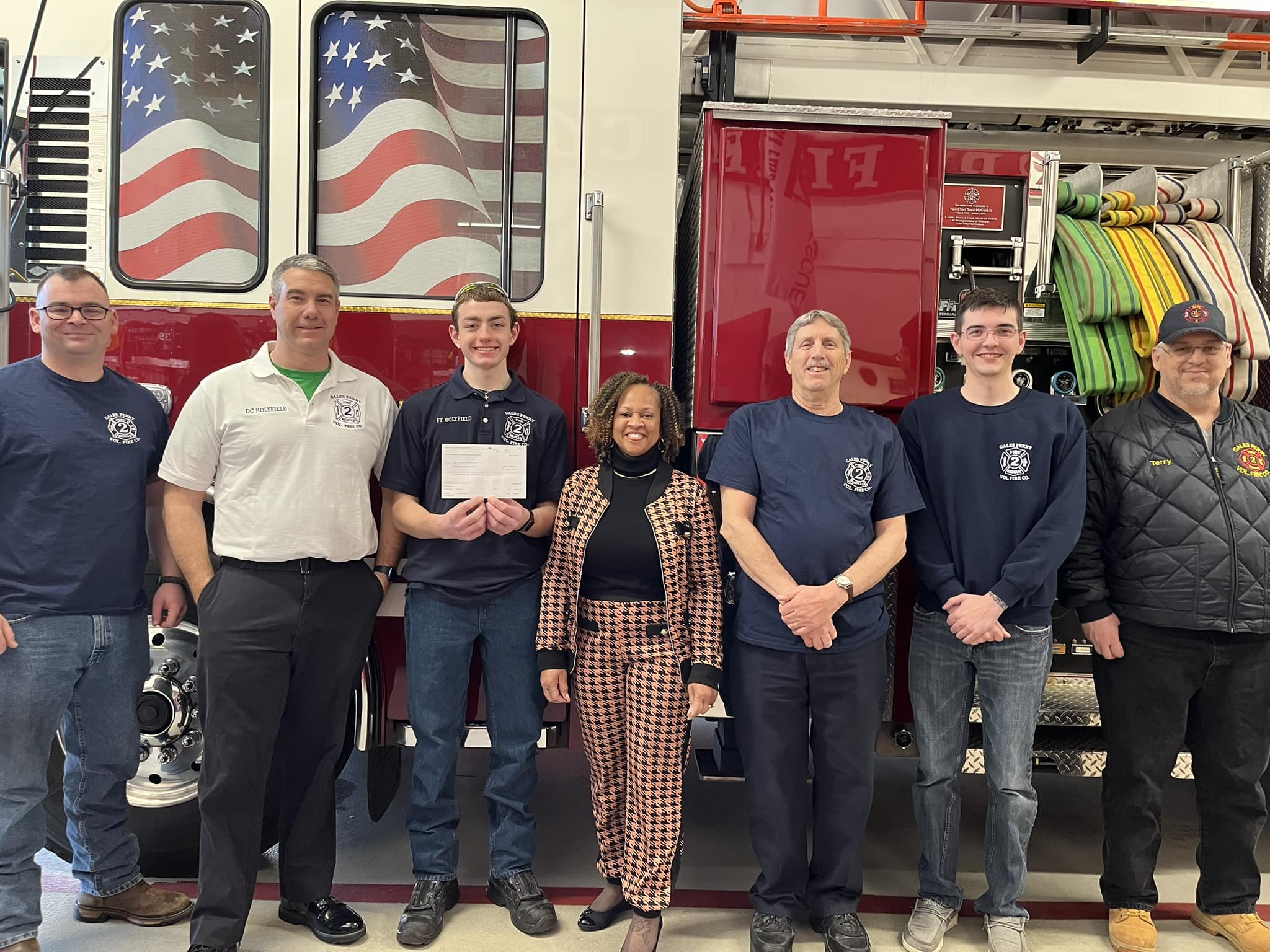 Posing in front of a fire truck