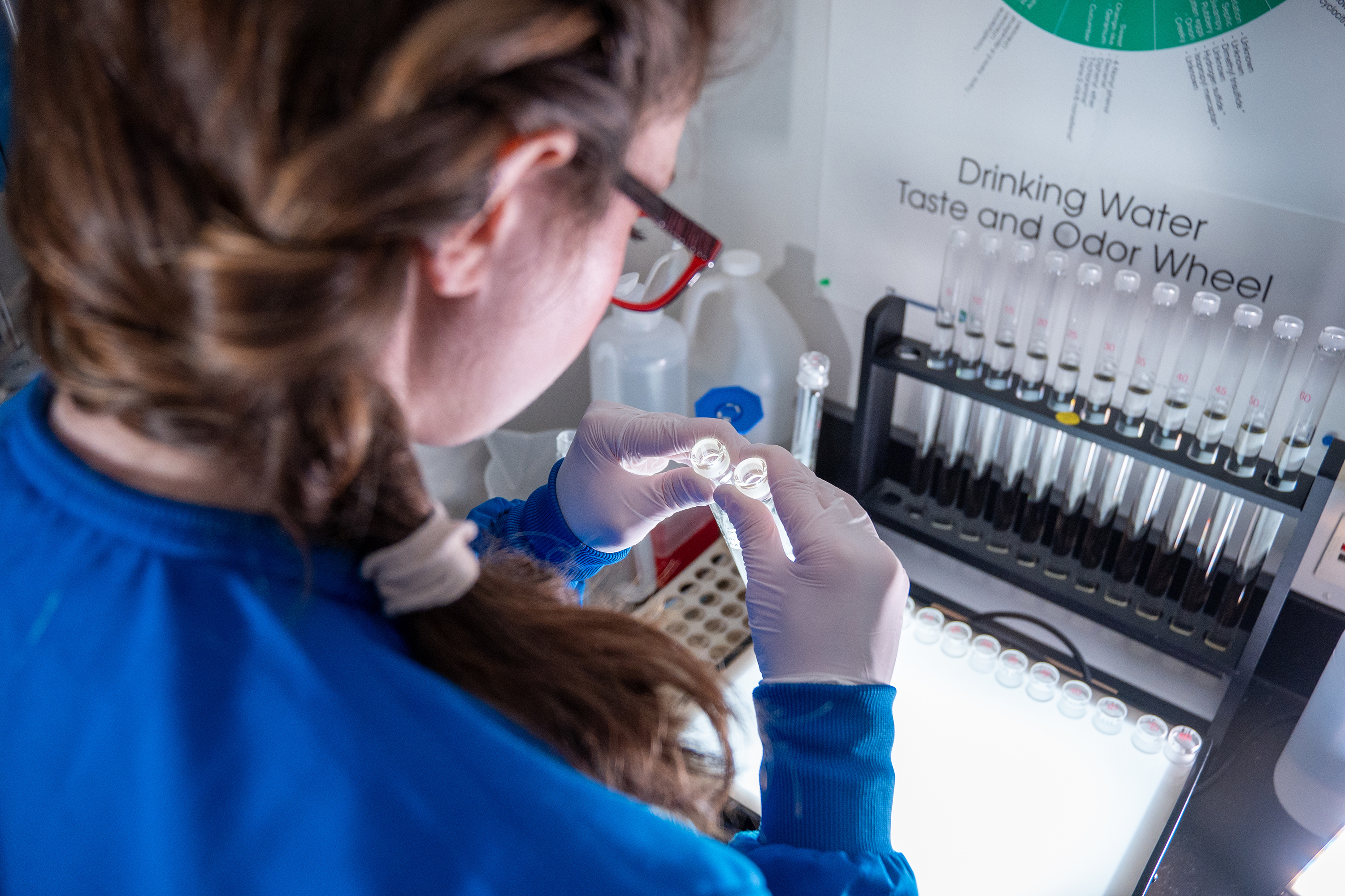 A woman testing water quality